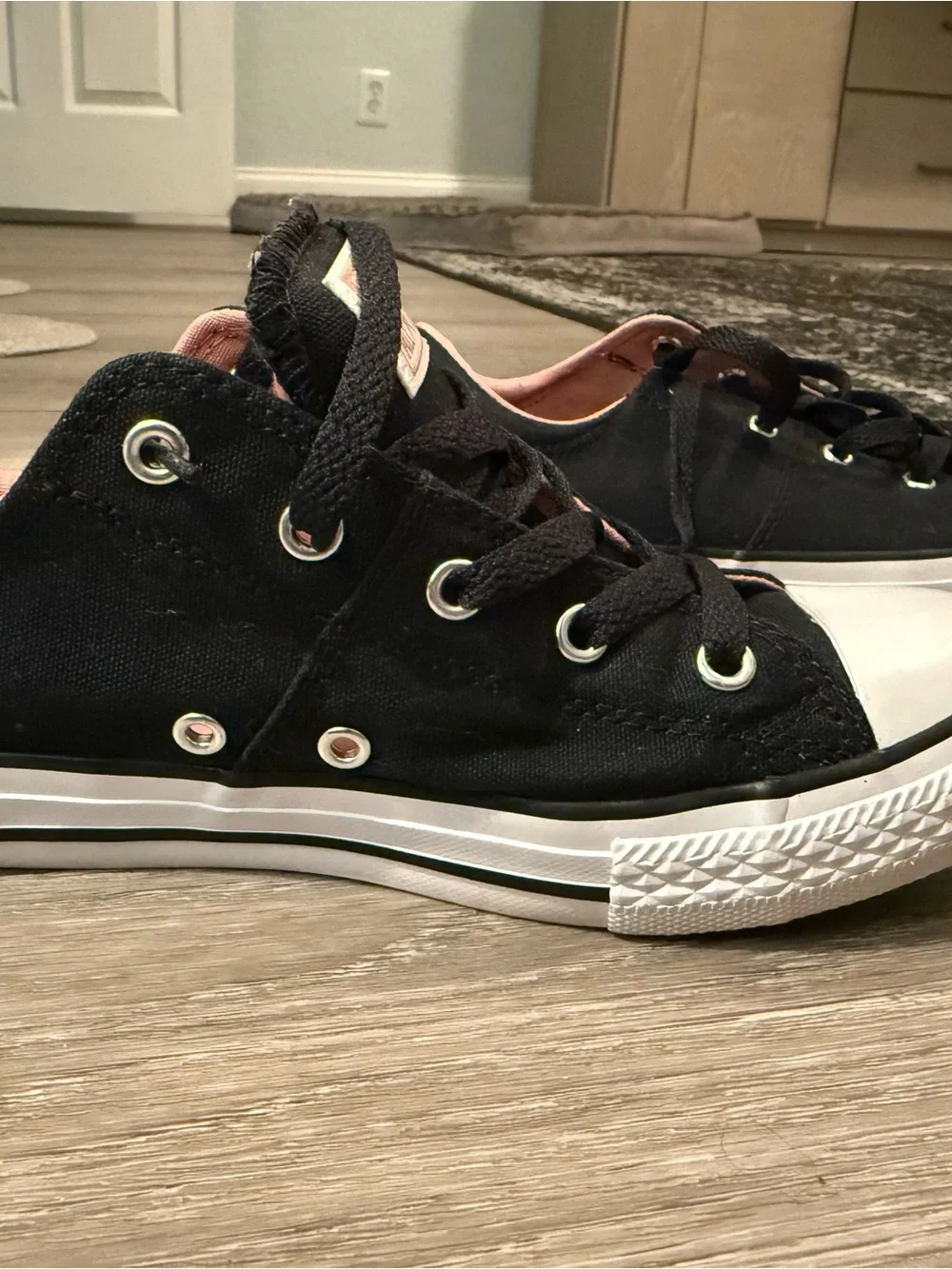 Converse Kids Black Low Top Sneakers with Pink Lining